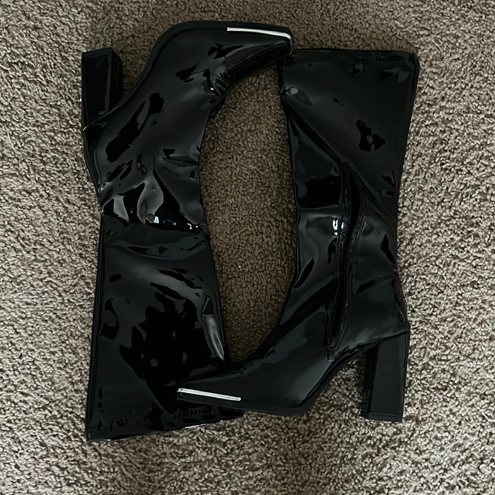 Black steel toe heeled boots